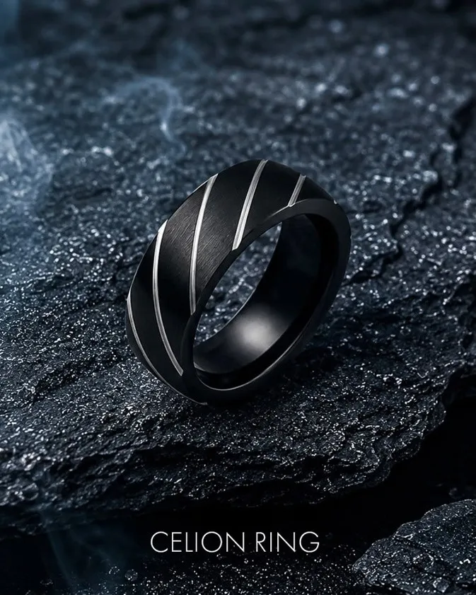 Black Mamba Celion ring with brushed diagonal grooves on dark rock
