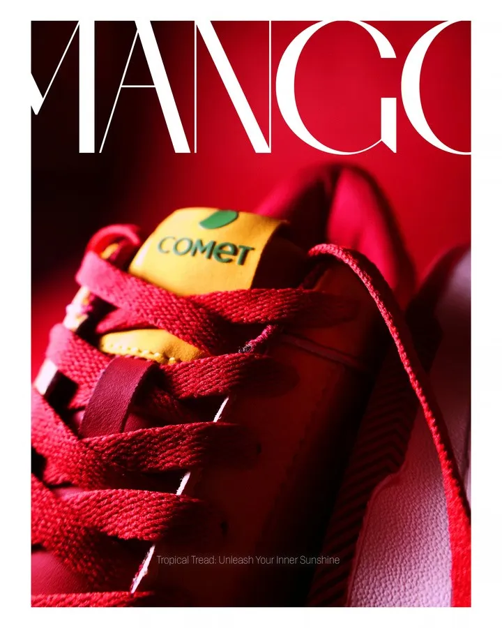Macro crop of red Comet sneaker laces and the yellow Comet tongue label
